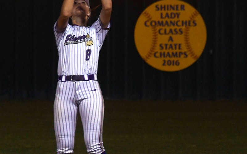 Taylor Kocian catches a fly ball during the third inning against Flatonia on March 2. She made two putouts in that game. Photo by Mark Lube.