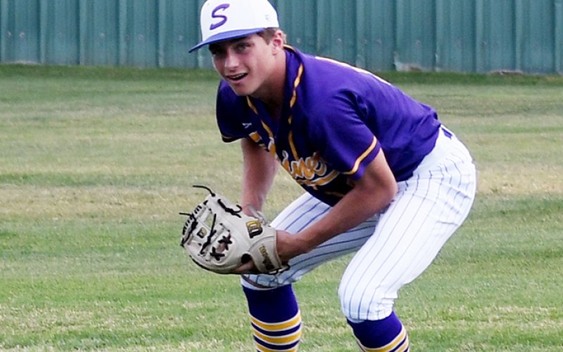 Clayton Fric gets ready to throw after fielding a ground ball against Giddings in the Hallettsville Tournament on Thursday. He had one assist against the Buffs.  Photo by Mark Lube.