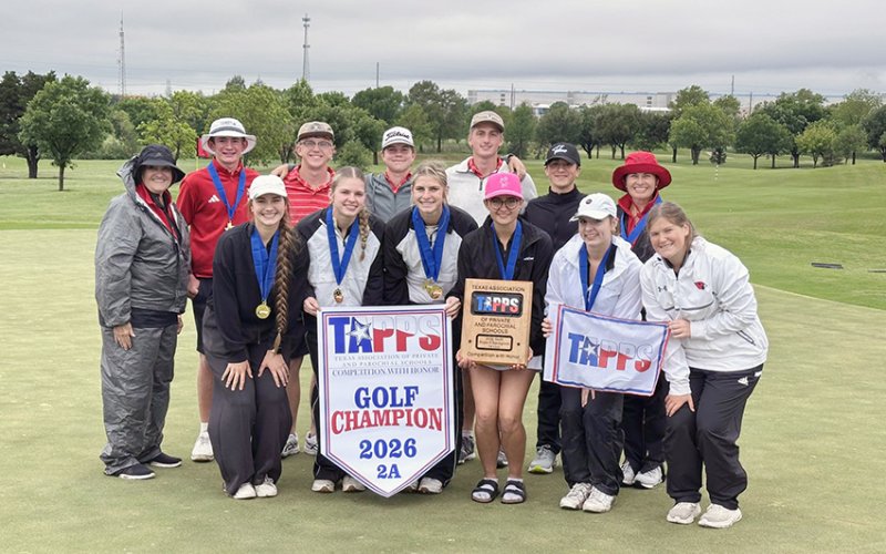 The St. Paul girls and boys golf teams along with the coaches pose with the girls 2A state banner and plaque. Photo courtesy of Nicco Brown.