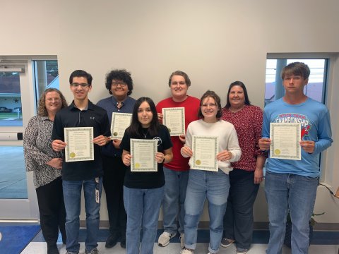 YHS art students and members of the Bulldog Band were honored at Monday’s YISD School Board meeting.