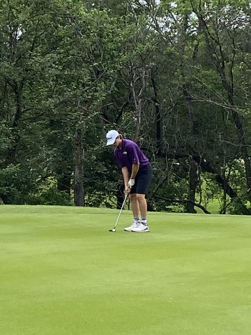 Beck Bishop lines up a shot at the state golf tournament last. Photo courtesy of James Pustka.