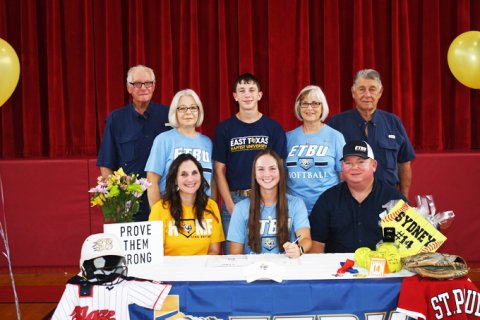 Senior Sydney Green signed with East Texas Baptist University for softball on Tuesday May 10. Seated from left, Tracy Green, Sydney Green and Darren Green. Standing from left, Donald Green. Bonnie Green, Garrett Green, Liz Mican and AJ Mican. Photo by Mark Lube.