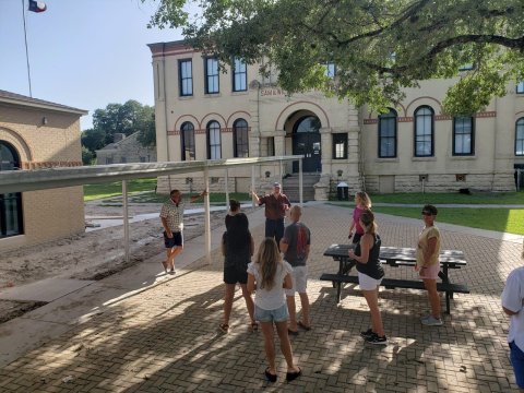 A tour group checks out the Moulton school construction a year ago.