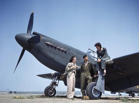 Original Caption: “WAFs and Army Pilot. The girls pilot the P-51s and other airplanes from factory to airbases within the United States.” Credit: Image Number 4A-22679-K619, Record Group 342, National Archives and Records Administration at College Park, College Park, Maryland