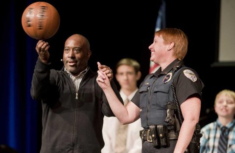 Former NBA player and Harlem Globetrotter Melvin Adams performs while speaking at an event.  Contributed Photo.