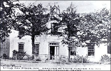 Early Day Stage Inn. Erected by Louis Turner. A.D. 1872  Hallettsville, Texas. Photo Courtesy Friench Simpson Memorial Library (Hallettsville).