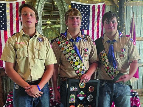 Beck Bishop, Dalton Patton and Travis Thibodeaux, left to right, earned the BSA Triple Crown Award. 