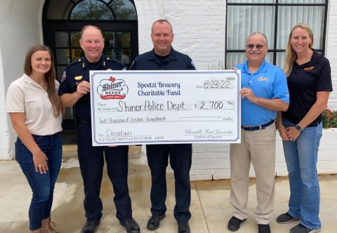 Pictured are, left to right, Lauren Schuette, Shiner Police Chief Kevin Kelso, Sergeant James Whited, Jimmy Mauric and Julie Boehm