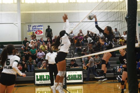 Luling tries to block an attack by Addison Pekar. Photo by Mark Lube