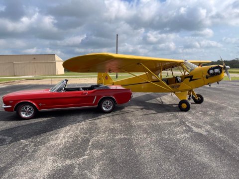 That red classic 1965 Ford Mustang under the wing of that bright yellow Piper Cub could be yours if you wind up being the lucky winner of the Hallettsville Barnstormers’ drawing. Only 2,000 tickets will be sold, with proceeds going to help fund scholarships to local graduates looking to the fields of aviation.