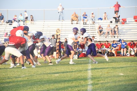 The Shiner offense executes a running play Friday evening against Tidehaven. Shiner ran for a total of 267 yards.Photo by Mark Lube.