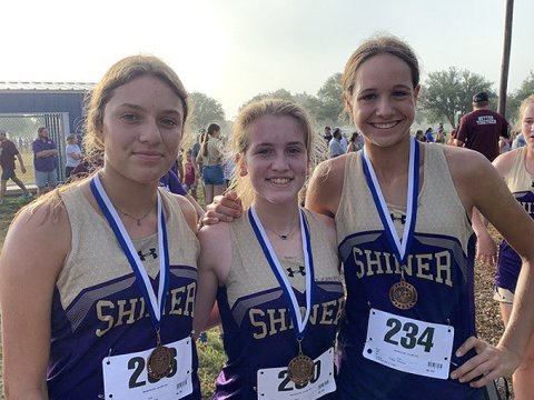 Lady Comanche medalists from left is Brinley Ramire, Hayleigh Burns and Erin Pustka. Photo courtesy of Michelle Winkenwerder.