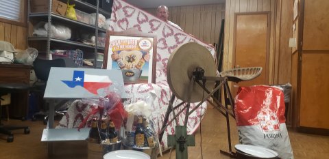 Deacon Michael Morkovsky helps us display a sampling of the many fine wares in Sunday’s noon auction, including hand stitched quilts, Shiner beer collectibles, antiques, furniture and all sorts of other great items. Head over to the Shiner KC Park, 102 S. Ave. G, for a whole day of fun. See you there! 