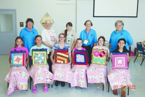 Pictured are students, seated, left to right, Sally Machacek (Shiner), McKenzie Kesler (Flatonia), Tara Raskob (Shiner), Markie Egan (Shiner), Clara Kinney (Flatonia), and Penny Rouse (Windcrest). Standing are guild members, left to right, Janet Zabransky, Mary Shafer, Kathy Riske, Irene Cerny and Janet Ferguson. Guild Members not pictured who assisted are Gladys Muehlstein, Rose Mary Havlik, Beni Gerdes, Carolyn Janak, Bernadette Kresta, and Debbie Novosad. Photo by Gene Cerny