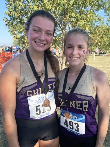 Shiner Lady Comanche medalists. Riley Rainosek (left) and Hayleigh Burns. Photo courtesy of Michelle Winkenwerder.