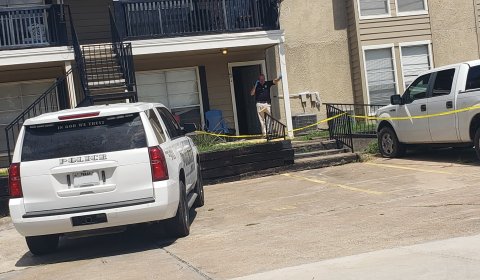 Interim Moulton Police Chief Daniel Beyer fields a call Thursday afternoon while investigating an apartment where a local woman, thought missing, was found on Thursday, having apparently passed away while she slept. Photo by Bobby Horecka