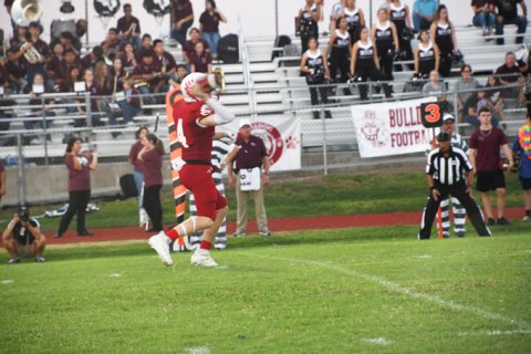 Jacob Wachsmuth threw for 118 yards and two touchdowns in the Catholic Bowl Saturday night against Muenster Sacred Heart in Frisco.
