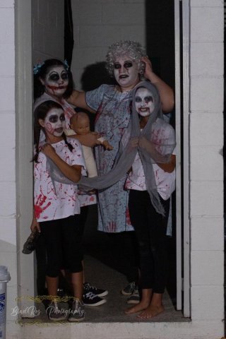  (Top row from left) Brailyn Jalufka, Courtney Henrichs, (Bottom row from left) Chloe Williams and Addyson Williams prepare to scare guests at the Lavaca Swimming Pool in October 2021. Contributed photo.