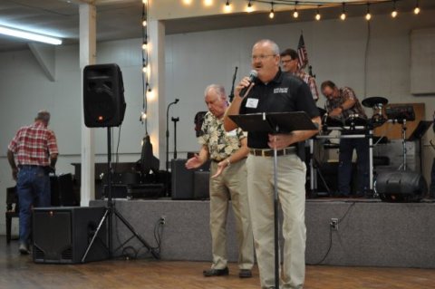 Daniel Beyer speaking at the 2019 Moulton School Reunion, as board president and police chief.