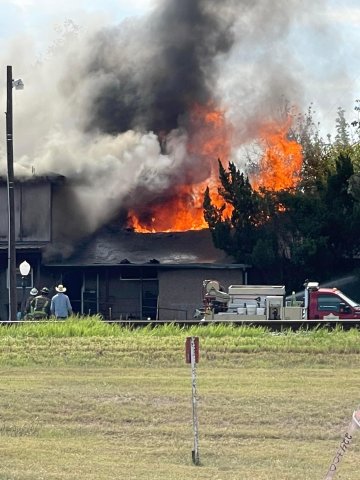 The home of Gary Hoover went in flames Monday, Oct. 3, burning his 70,000-plus book collection. Photo Kayla Michalec