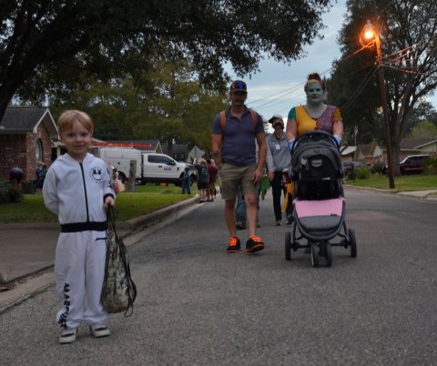  (From left) Johnny Steinhauer, Jerry Steinhauer, and Rachel Harding trick-or-treat through the streets of Hallettsville Monday, Oct. 31.