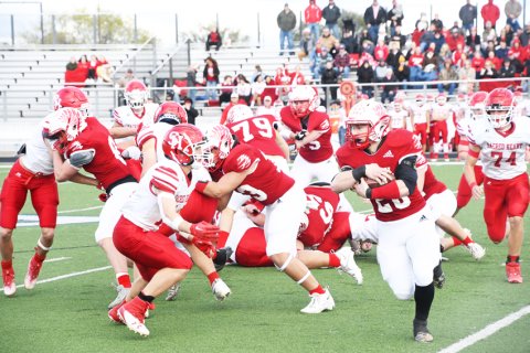 Zane Barta gains yardage. Photo by Mark Lube.