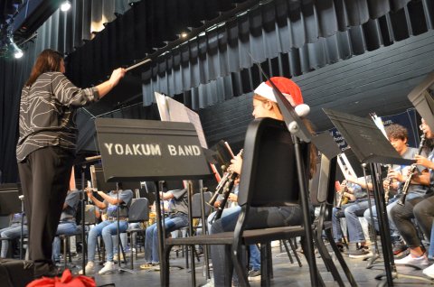 YJH Band Director Lacy Orsak leads the YJH Concert Band Sunday afternoon, Dec. 11.  Photo by Hans Lammeman.