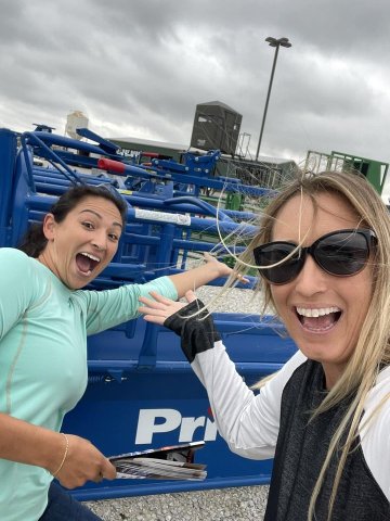 (From left) Brittani Richter and Kim Chandler pose with the roping chute purchased for the Yoakum Rodeo Arena.  Contributed Photo