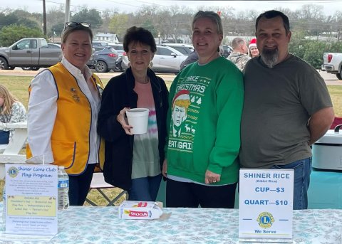 Pictured are, left to right, Lion Melinda Hodges, supporter Jane Baxman, Lion Jennifer Patek and Lion David Fiedler.