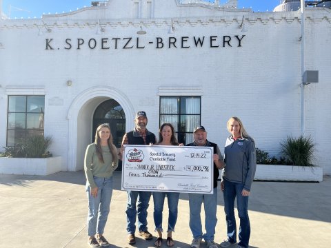 Pictured are, left to right, Charitable fund member Lauren Schuette, Shiner Junior Livestock show members Cody Crismon, Michelle Herman and Paul Koone, and Charitable fund member Julie Boehm. Contributed photo.