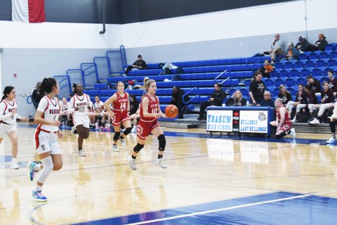 St. Paul sophomore Dallyn Pesek dribbles toward the basket with opposing players and teammate Avery Pesek (#14) trying to keep pace during St. Paul’s game against Victoria West’s JV squad on Wednesday. Photo by Mark Lube.