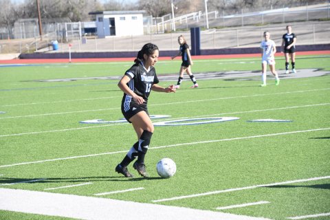 Adamary Lopez dribbles during the January 5 game against El Campo. Photo by Mark Lube.