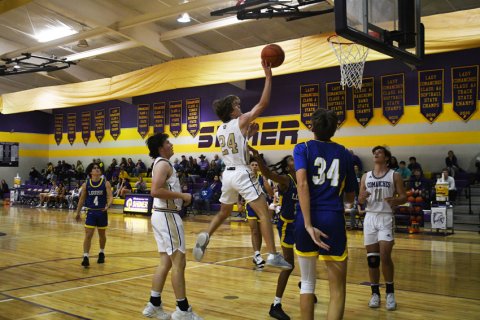 Micah Carson scored 14 points in the Jan. 13 win over Louise. Photo by Mark Lube.