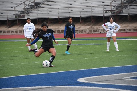 Daphne Oviedo takes a first-half penalty Friday against SA Memorial. Photo by Mark Lube.