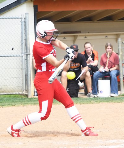Julia Machacek gets a hit in Friday’s game against Smithville. The senior got  one of St. Paul’s nine hits in the game. Photo by Mark Lube.