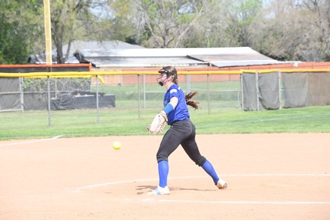 Olivia Fojt makes a pitch against St. Paul on Friday. Photo by Mark Lube.