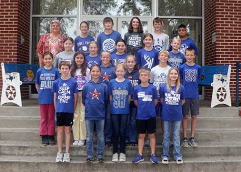 The Sacred Heart Catholic School 5th graders recently participated in the St. Jude Math-A-Thon program and raised $2,358.25. The amount raised  goes toward helping kids who battle cancer and other deadly diseases. During the past years, the 5th grade classes have been involved in the program and have raised a total of over $14 thousand. The photo shows this year’s 5th grade class along with their teacher and coordinator of the school’s participation, Doris Fenner. Photo by Ruth Barton