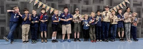 The pinewood derby racers (pictured from left to right) were Clayton Coburn, Clinton Alexander, Joseph Heinhold, Kenward Kolar, Andrew Machacek, William Ulcak, Isaac Bonorden, Nathan Killmer, Eli Bays, Jacob Mahurin, Pierce Wallace, Kolton Wilgus, Ryan Bays, Dawn Bishop, and Caleb Killmer. 
