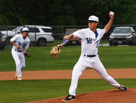 Wyatt Hanzelka makes a pitch in the Tidehaven game. Photo by Mark Lube.