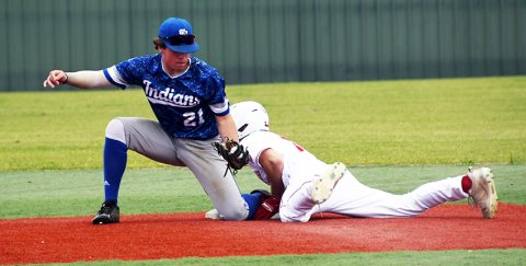 Fisher Davis attempts to complete a steal of second base despite the tag attempt of SH shortstop Josh Terry. Unfortuntately, Terry was ruled to have tagged Davis before he reached base. Photo by Mark Lube. 