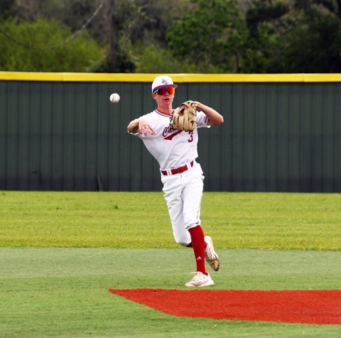 St. Paul shortstop Blaine Humes makes a throw to first base in the Cardinals’ 15-0 win over Baytown Christian Monday afternoon at the Shiner Starplex in the first round of the TAPPS Division V playoffs. Photo by Mark Lube.