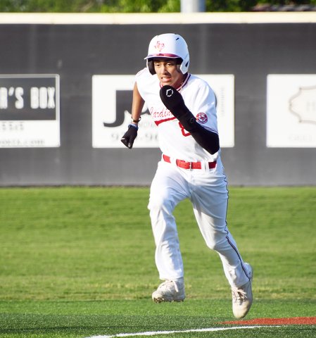 Zeke Rodriguez hustles to third base during St. Paul’s 13-0 regional win over Bryan Allen Academy May 3 in Fayetteville. He scored twice on two hits, had an RBI and stole one base. Photo by Mark Lube.