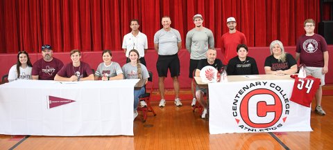St. Paul seniors Trent Brown (Trinity University, track) and Carson McNabb (Centenary College of Louisana, football) officially signed their letters of committment last week. Left table, from left is Paige Brown, Brad Brown, Trent Brown, Nicco Brown and Faith Brown. Standing in between the tables, from left, is Lance Giese, Jake Wachsmuth, Ryan Geiger, Ryan Geiger and Charlie Mieschen. Right table, from right is Matt McNabb, Carson McNabb, Dana McNabb and Kash McNabb. Photo by Mark Lube.