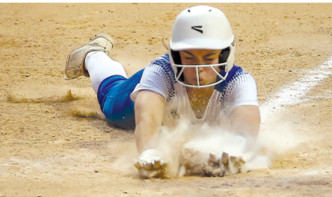 Ava Lackey scores on a wild pitch in the fifth inning Chuck Grafe/Tribune-Herald