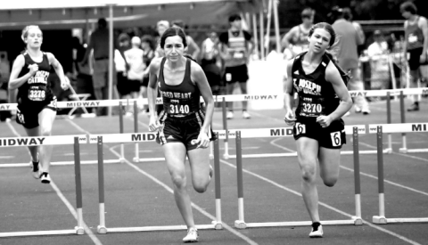 Arianna Henke, center, ran the last race of her career at the TAPPS state meet. Mark Lube/Shiner Gazette