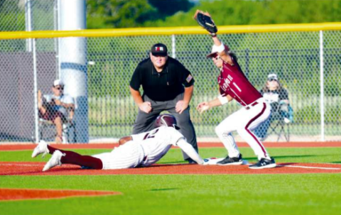 Jorian Wilson easily gets back to first-inning pickoff attempt.