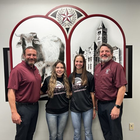 Hallettsville High School Lady Brahmas, Olivia Etzler and April Leopold were recognized at Monday’s HISD Board of Trustees Meeting. The tennis doubles duo qualified for the UIL State Tennis Tournament held April 25-26. From left are HISD athletic director Levi Montgomery, Leopold, Etzler and Board of Trustee president Robert Lundy. Photo by Trina Patek