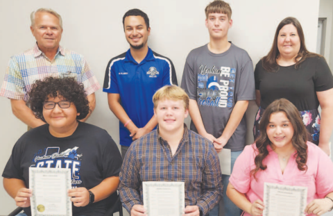 Pictured in the front row from left to right are Rafael Quilpas, River Bergman, and Delanie Dominguez. Pictured in the back row from left to right are Yoakum ISD School Board President Glen Kusak, Yoakum High School Band Director Aaron Villarreal, Dylan Shimek, and Yoakum High School Band Director Lacy Orsak.