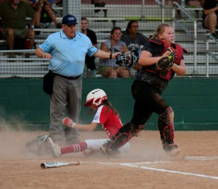 Kinley Migl scores a run in a previous win. Chuck Grafe/TribuneHerald