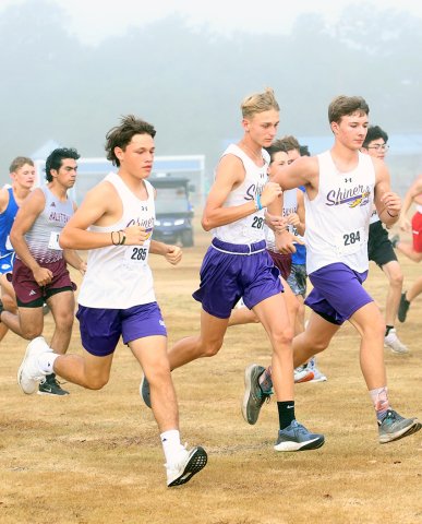 Shiner boys cross country runners from left are Elijah Mesa, Boe Boehm and Kade Matula during the boys varsity race in Yoakum on Saturday. Shiner placed No. 13 with 303 points.  Photo by Raymond Rosas.